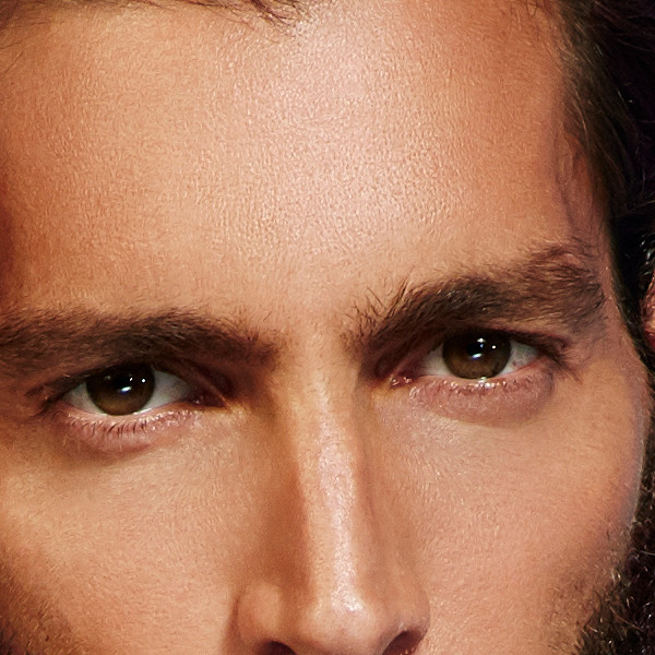Brow and under-eye. Marks on the forehead resolved one by one. The frown line was eased with light and shade, not erased. The under-eye was lifted keeping its fold.